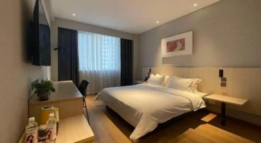 Bed in Jinjiang Inn Huizhou Xihu Lake Shuidong Street River View