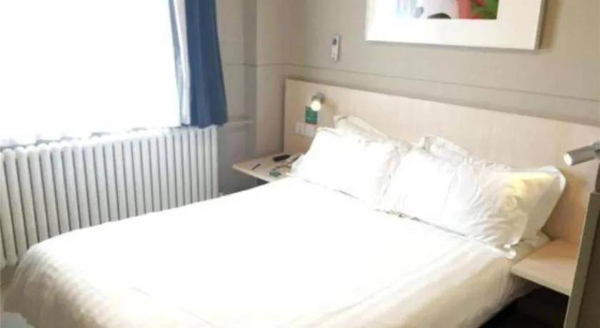 Bed in Jinjiang Inn Ulanqab Jining 1st Middle School