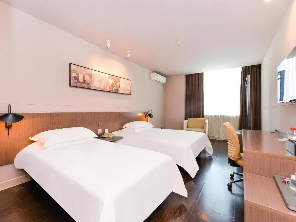 Bed in Jinjiang Inn Select Shanghai Zhangjiang High Tech Park Branch Bed in Jinjiang Inn Select Shanghai Zhangjiang High Tech Park Branch