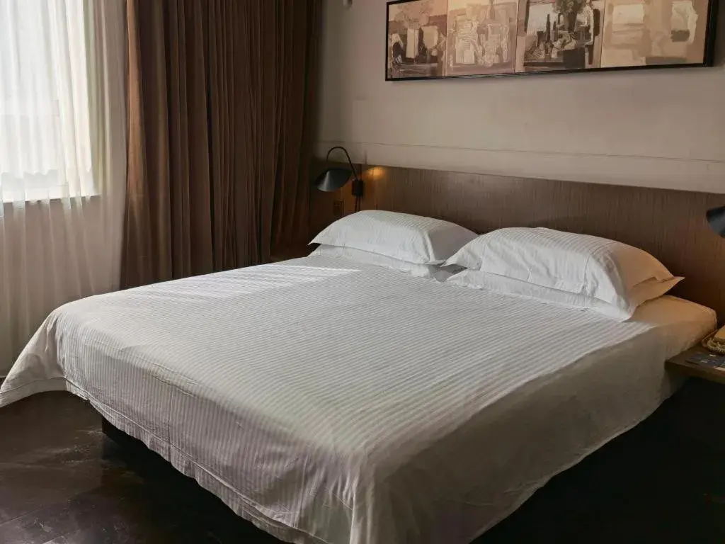 Bed in Jinjiang Inn Select Shanghai Zhangjiang High Tech Park Branch Bed in Jinjiang Inn Select Shanghai Zhangjiang High Tech Park Branch