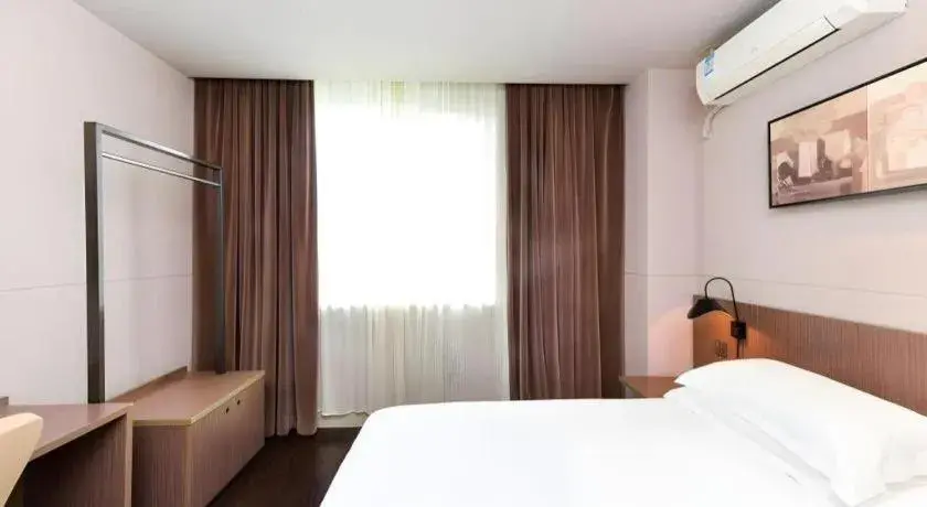 Bed in Jinjiang Inn Select Shanghai Zhangjiang High Tech Park Branch Bed in Jinjiang Inn Select Shanghai Zhangjiang High Tech Park Branch