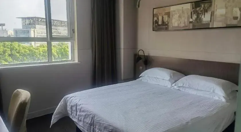 Bed in Jinjiang Inn Select Shanghai Zhangjiang High Tech Park Branch Bed in Jinjiang Inn Select Shanghai Zhangjiang High Tech Park Branch