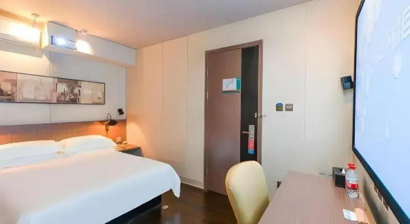 Bed in Jinjiang Inn Select Shanghai Zhangjiang High Tech Park Branch Bed in Jinjiang Inn Select Shanghai Zhangjiang High Tech Park Branch
