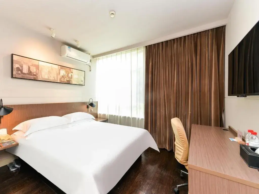 Bed in Jinjiang Inn Select Shanghai Zhangjiang High Tech Park Branch Bed in Jinjiang Inn Select Shanghai Zhangjiang High Tech Park Branch