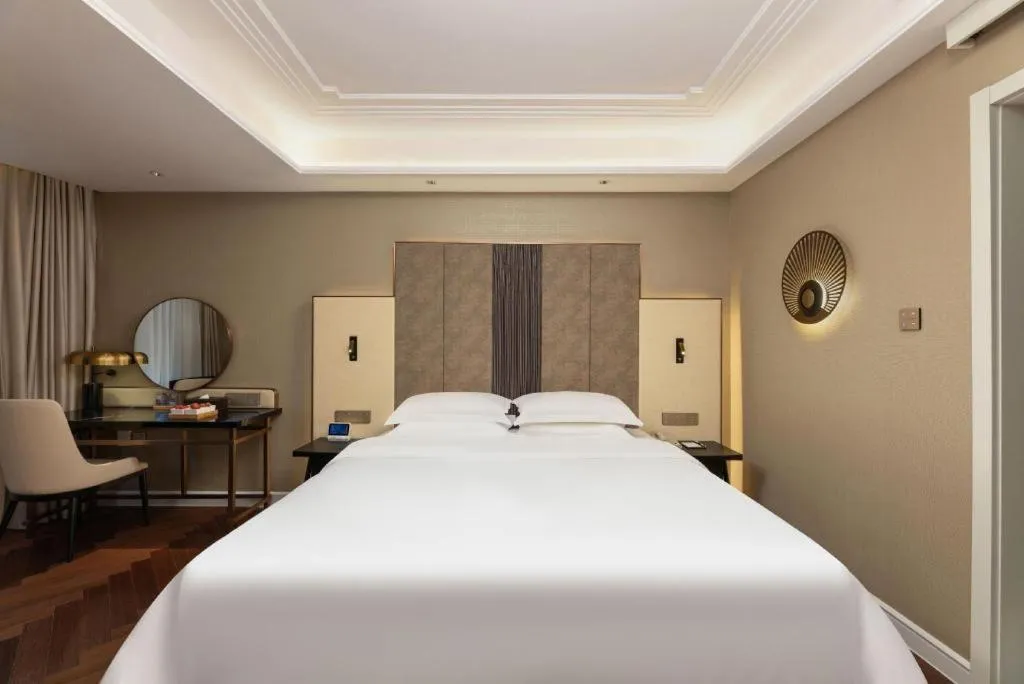 Bed in Metropolo Hotel Hefei Baohe Wandabao Park Metro Station