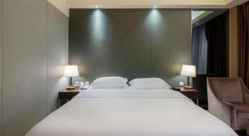 Bed in Metropolo Hotel Hefei Baohe Wandabao Park Metro Station