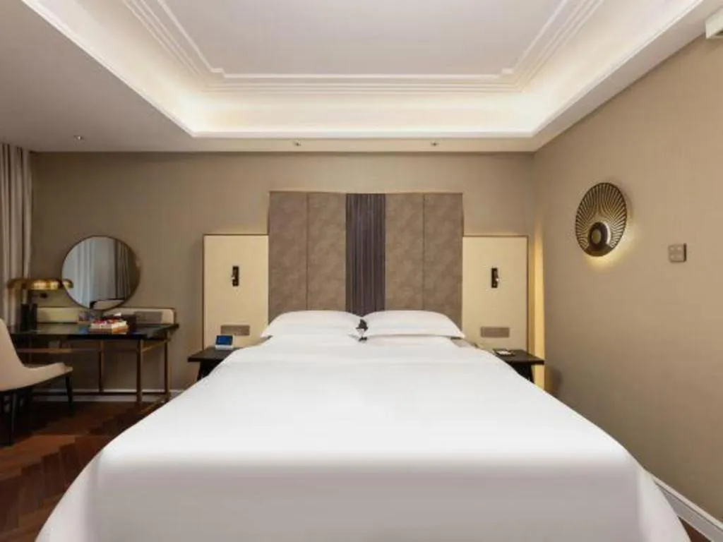 Bed in Metropolo Hotel Hefei Baohe Wandabao Park Metro Station