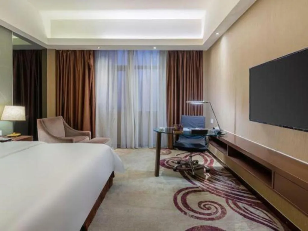 Bed in Metropolo Hotel Hefei Baohe Wandabao Park Metro Station