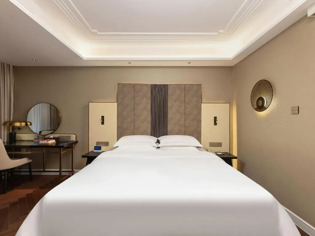 Bed in Metropolo Hotel Hefei Baohe Wandabao Park Metro Station