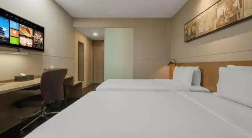 Bed in Jinjiang Inn Select Shanghai Expo Park Dezhou Road Bed in Jinjiang Inn Select Shanghai Expo Park Dezhou Road