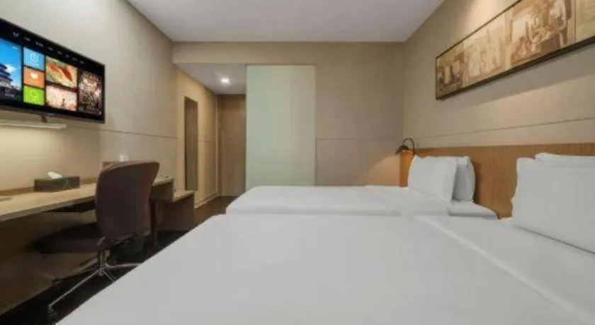 Bed in Jinjiang Inn Select Shanghai Expo Park Dezhou Road