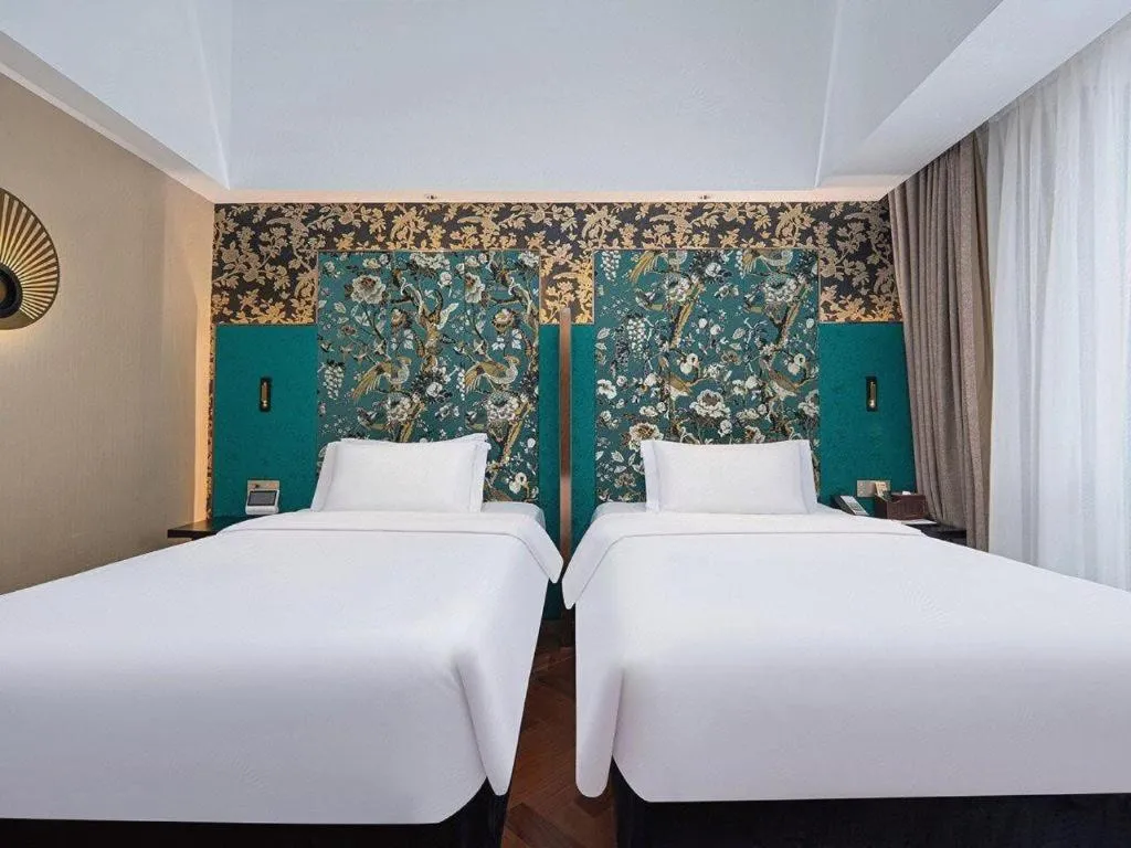 Bed in Jinjiang Metropolo Hotel - Ningde Wanda Plaza