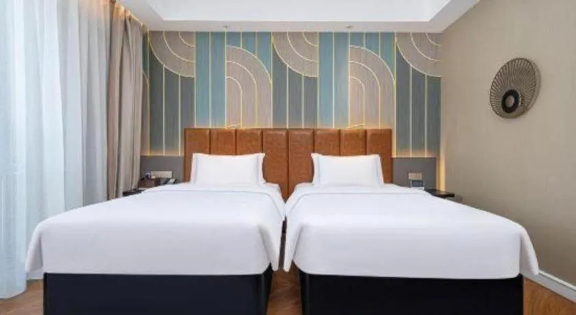 Bed in Jinjiang Metropolo Hotel - Ningde Wanda Plaza