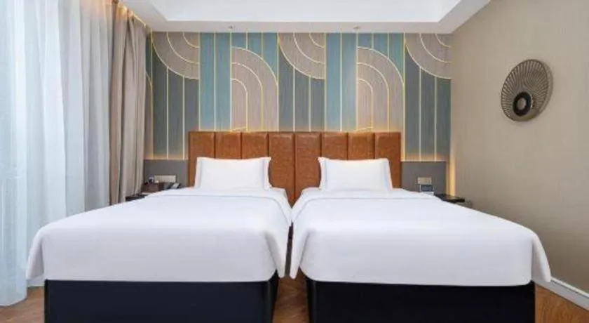 Bed in Jinjiang Metropolo Hotel - Ningde Wanda Plaza