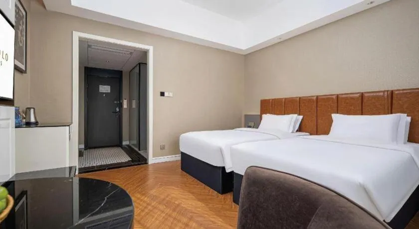 Bed in Jinjiang Metropolo Hotel - Ningde Wanda Plaza