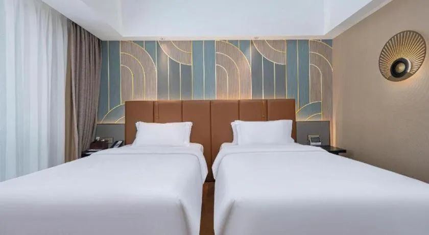 Bed in Jinjiang Metropolo Hotel - Ningde Wanda Plaza