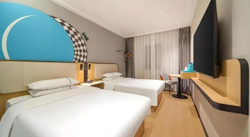 Bed in City Comfort Inn Guangzhou Tiyu West Road Metro Station Bed in City Comfort Inn Guangzhou Tiyu West Road Metro Station