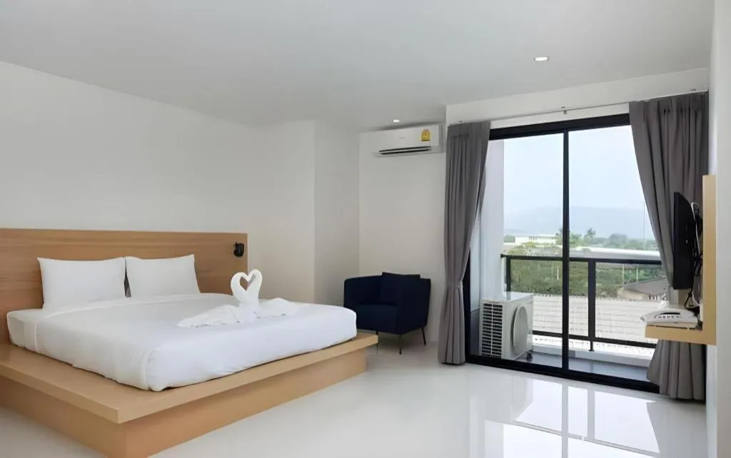 Bed in Le Park Hotel