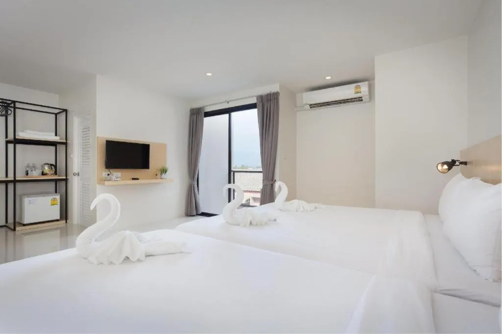 Bed in Le Park Hotel