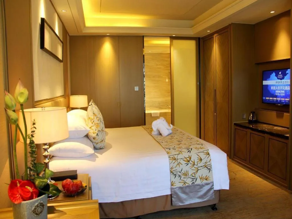 Bed in New Century Grand Hotel Hangzhou Zheshang