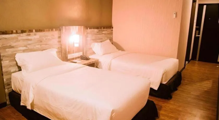 Bed in The Golden Bay Hotel Batam