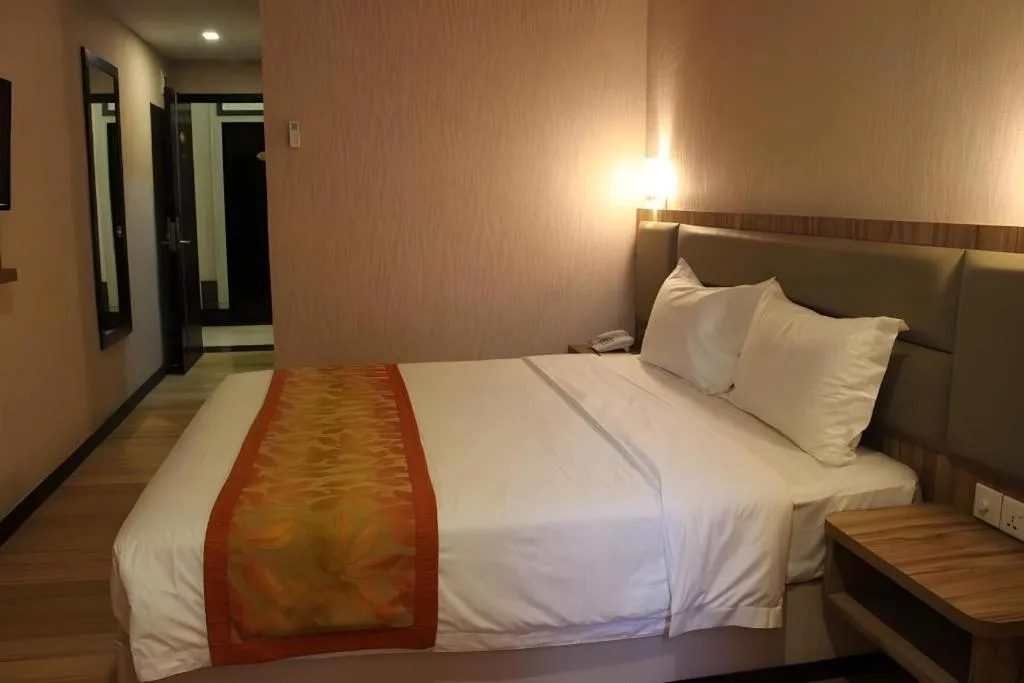 Bed in The Golden Bay Hotel Batam