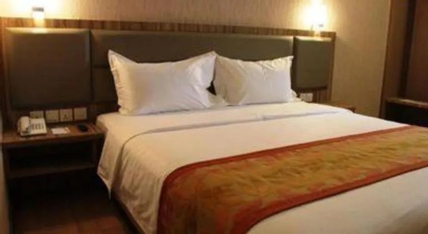 Bed in The Golden Bay Hotel Batam