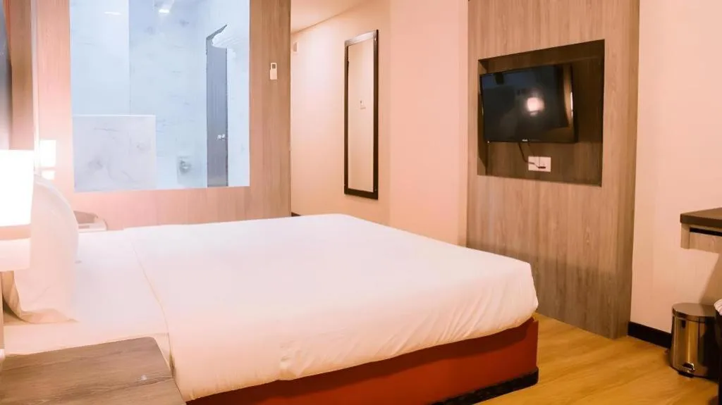 Bed in The Golden Bay Hotel Batam