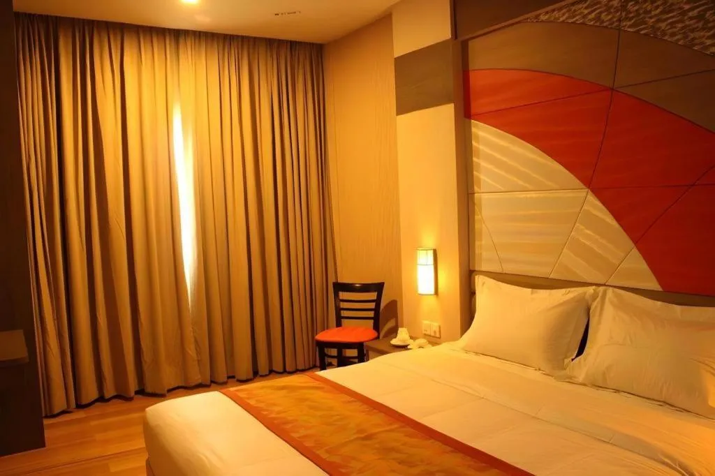 Bed in The Golden Bay Hotel Batam