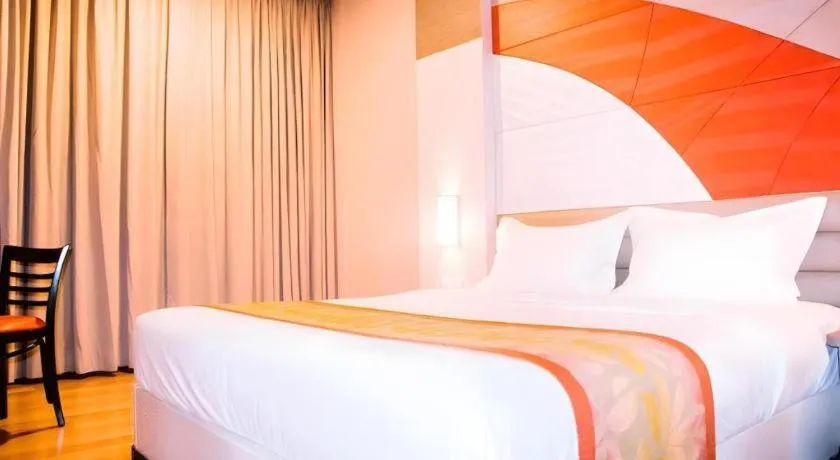 Bed in The Golden Bay Hotel Batam