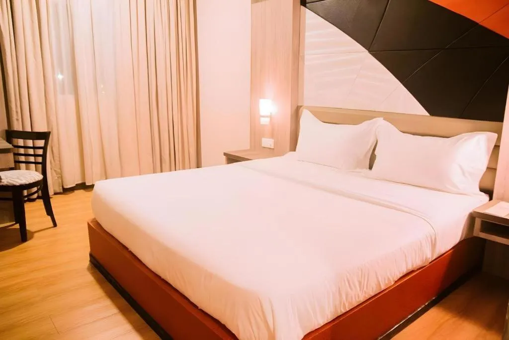 Bed in The Golden Bay Hotel Batam