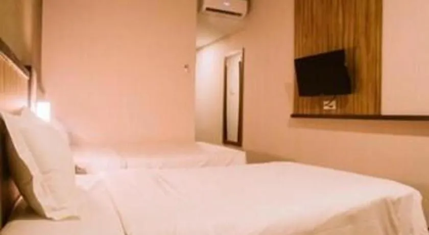 Bed in The Golden Bay Hotel Batam