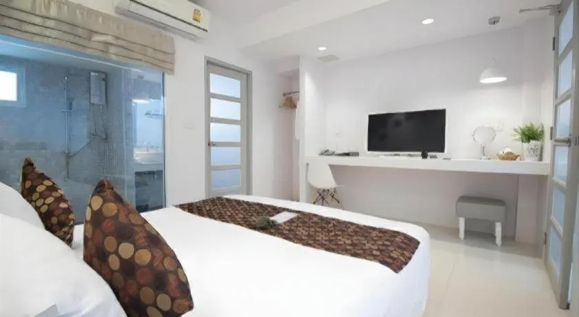 Bed in NanNakara Boutique Hotel