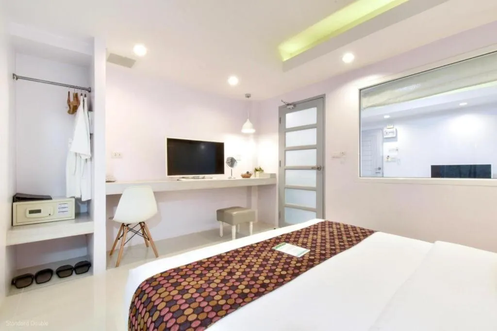 Bed in NanNakara Boutique Hotel