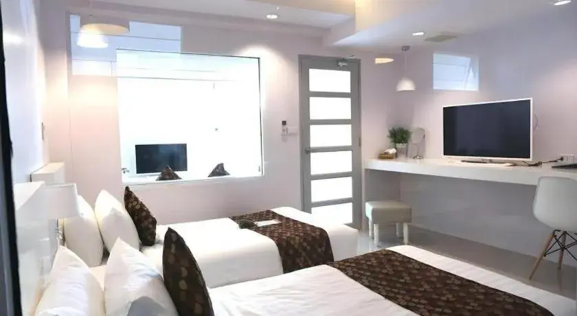 Bed in NanNakara Boutique Hotel Bed in NanNakara Boutique Hotel