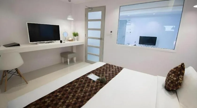 Bed in NanNakara Boutique Hotel