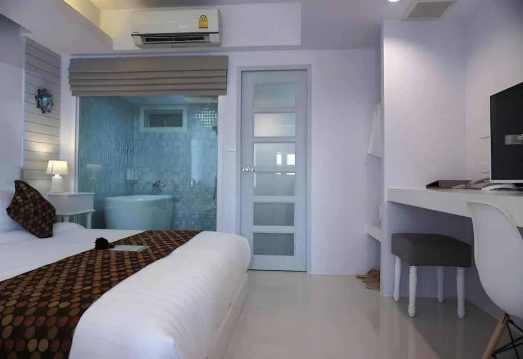 Bed in NanNakara Boutique Hotel