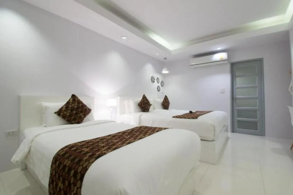 Bed in NanNakara Boutique Hotel