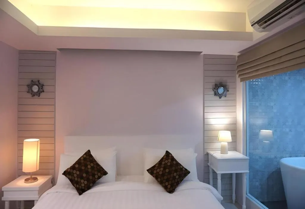 Bed in NanNakara Boutique Hotel