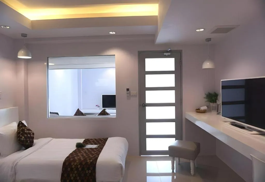 Bed in NanNakara Boutique Hotel