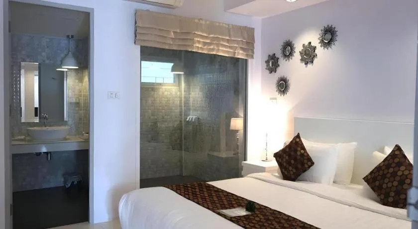 Bed in NanNakara Boutique Hotel