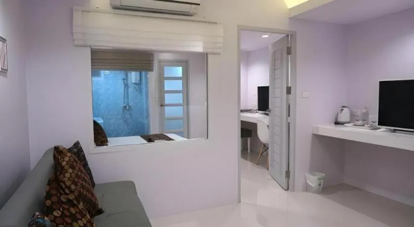 Bed in NanNakara Boutique Hotel