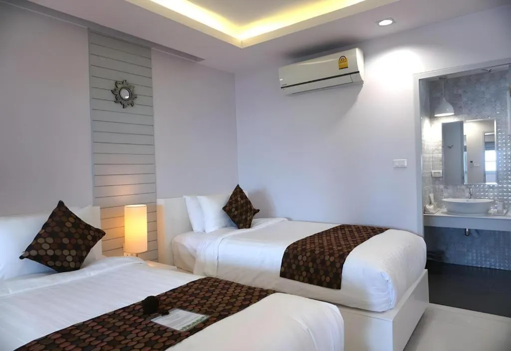 Bed in NanNakara Boutique Hotel