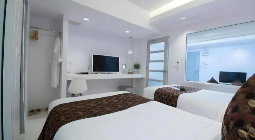 Bed in NanNakara Boutique Hotel