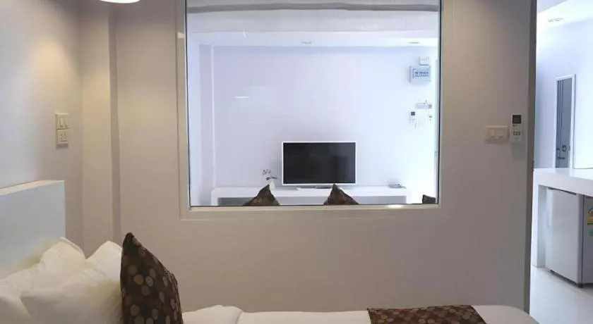 Bed in NanNakara Boutique Hotel