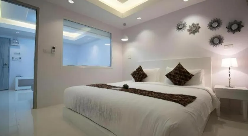 Bed in NanNakara Boutique Hotel