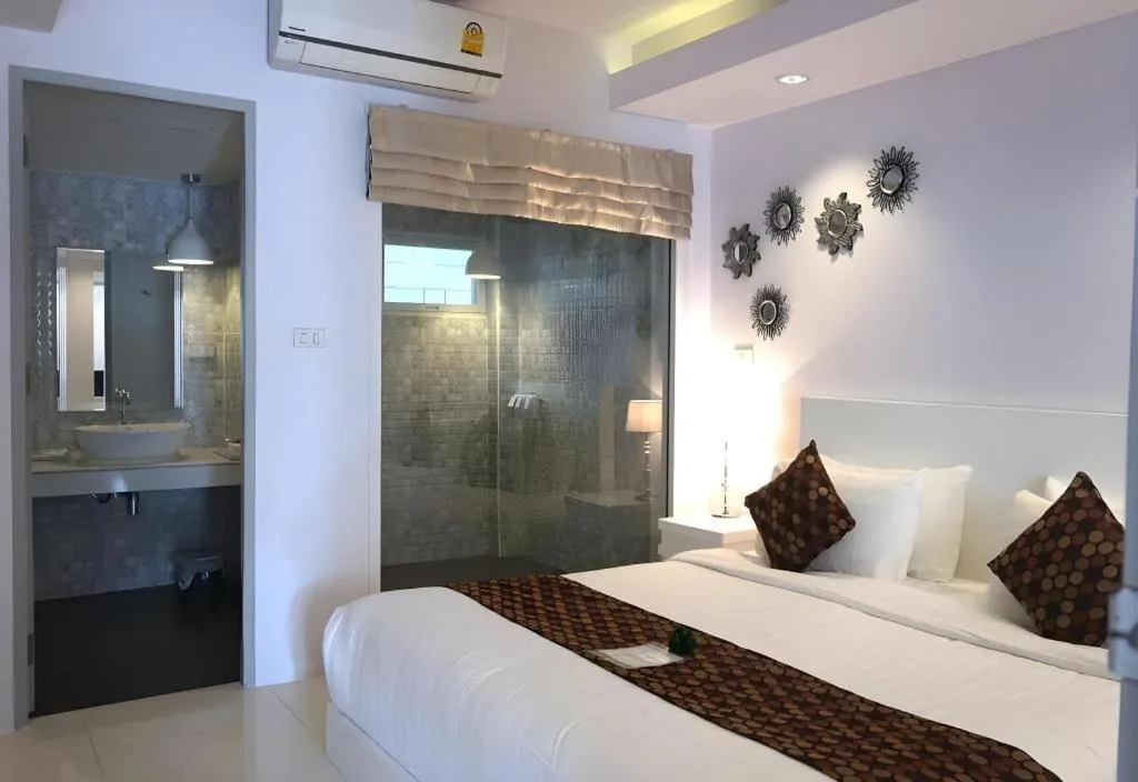 Bed in NanNakara Boutique Hotel