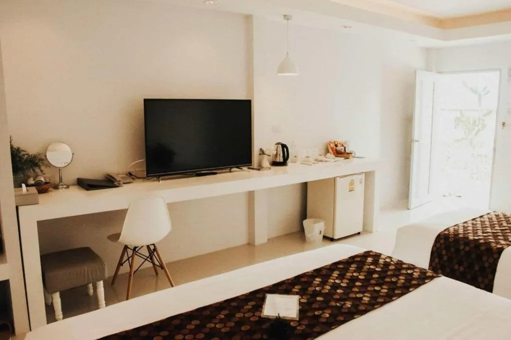 Bed in NanNakara Boutique Hotel