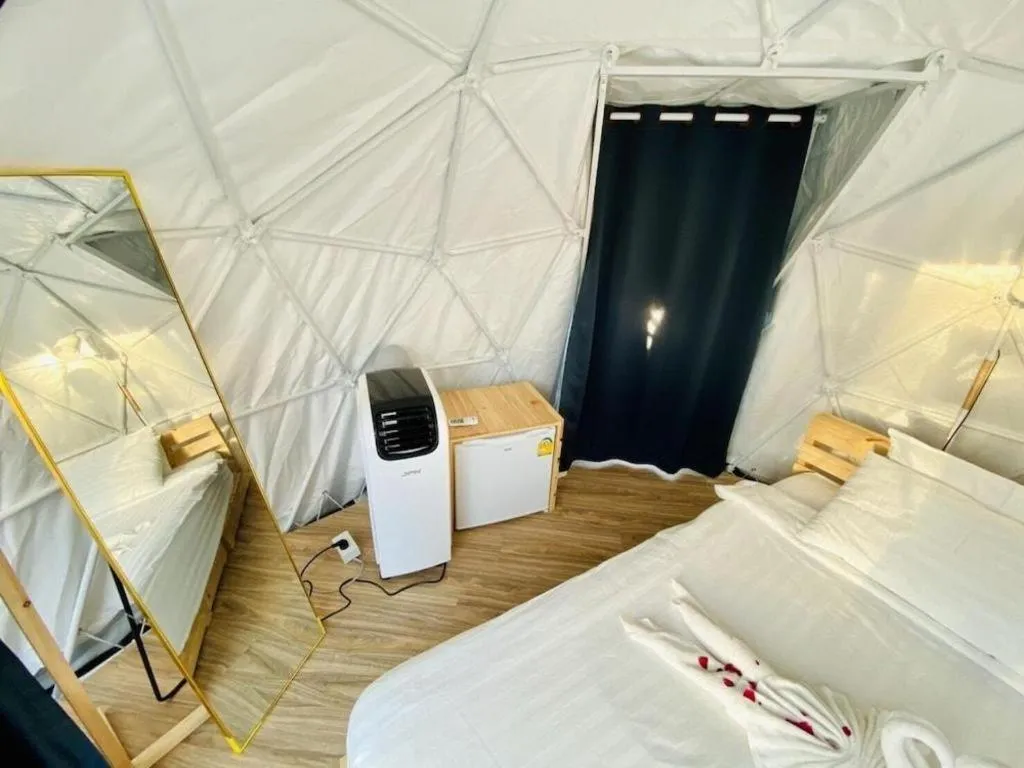 Bed in The White House Boutique Resort