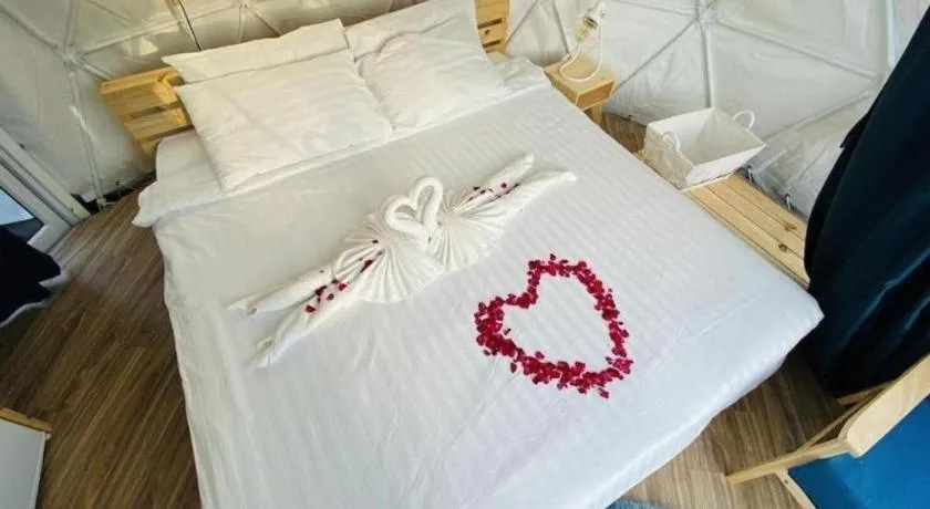 Bed in The White House Boutique Resort